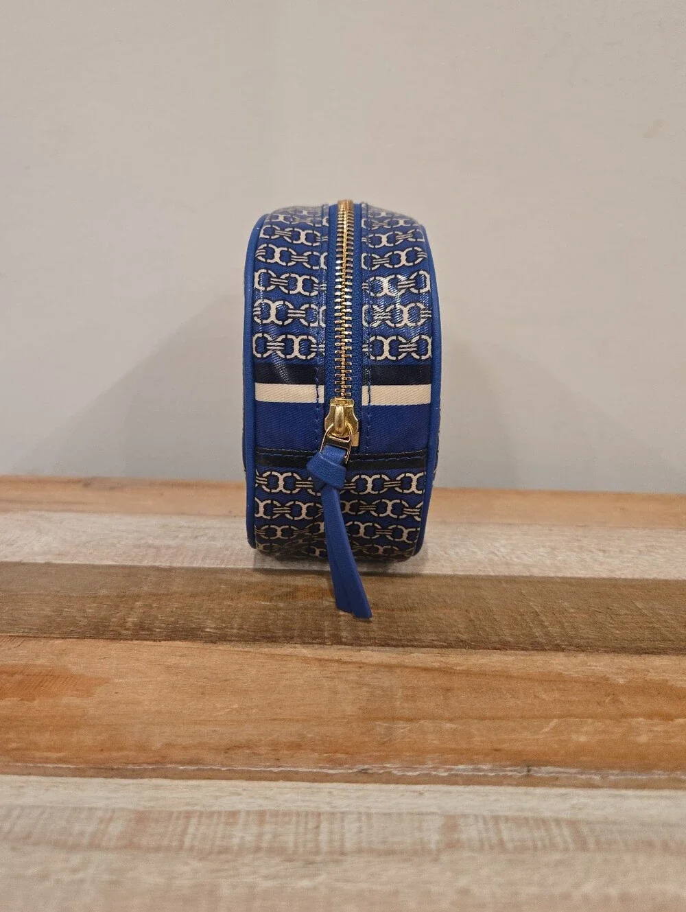 Tory Burch Gemini Link Stripe Makeup Bag With Vertical Striped Design.